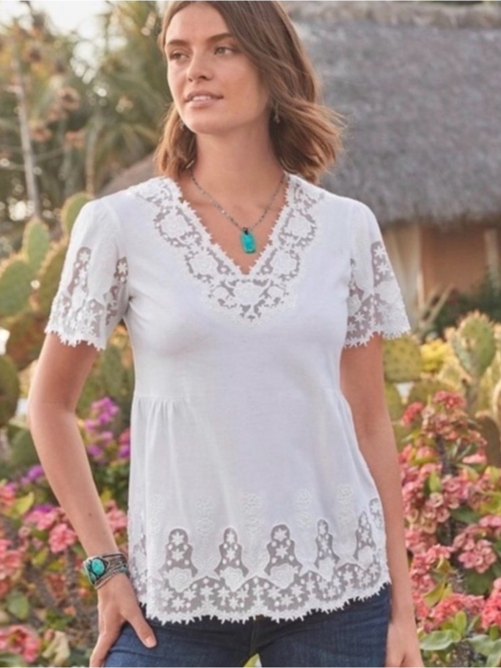 Sundance short-sleeve top featuring a V-neckline and intricate floral Lace - Picture 1 of 9